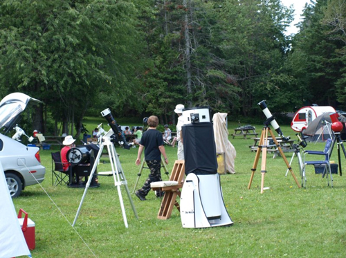 Camping and telescopes setup at the COW Mactaquac Star Party in Mactaquac Provincial Park, New Brunswick.