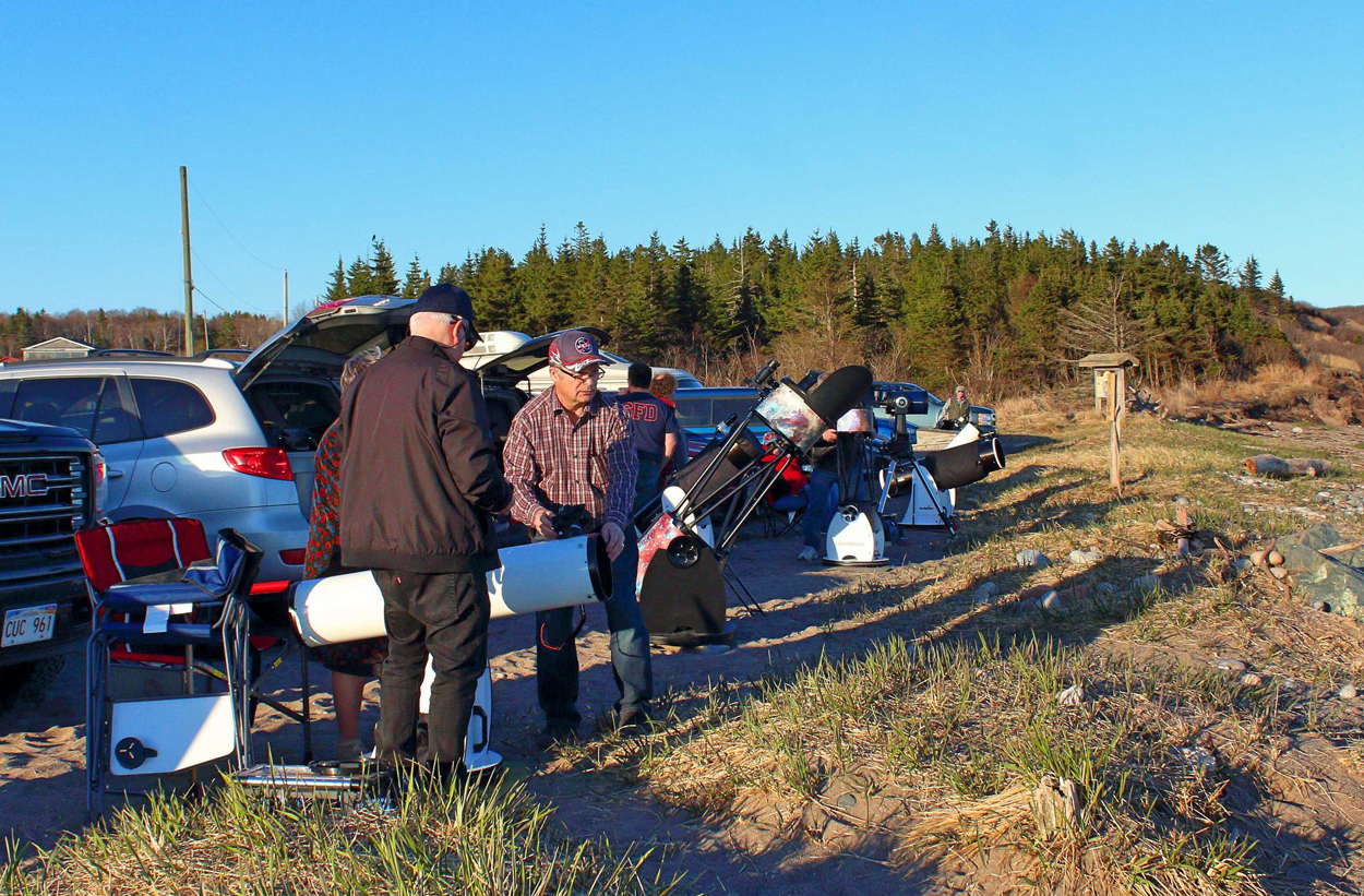 Photo showing a group of astronomers from the Saint John Astronomy Club having a Mini Star Party at Saints Rest Beach in Saint John, NB, May 2019. Photo by Trudy Almon.
